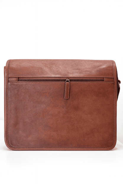 Brown leather messenger bag on a white background