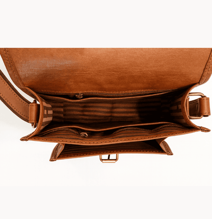 Brown leather handbag with gold hardware on a white background